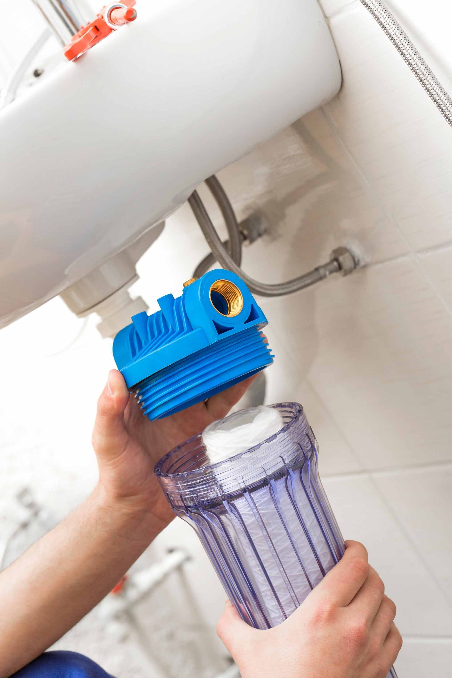 Plumber Installing new water filtration system