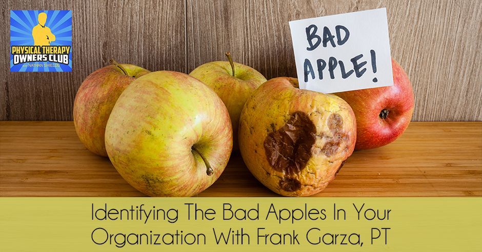 A bunch of apples with a sign that says bad apple