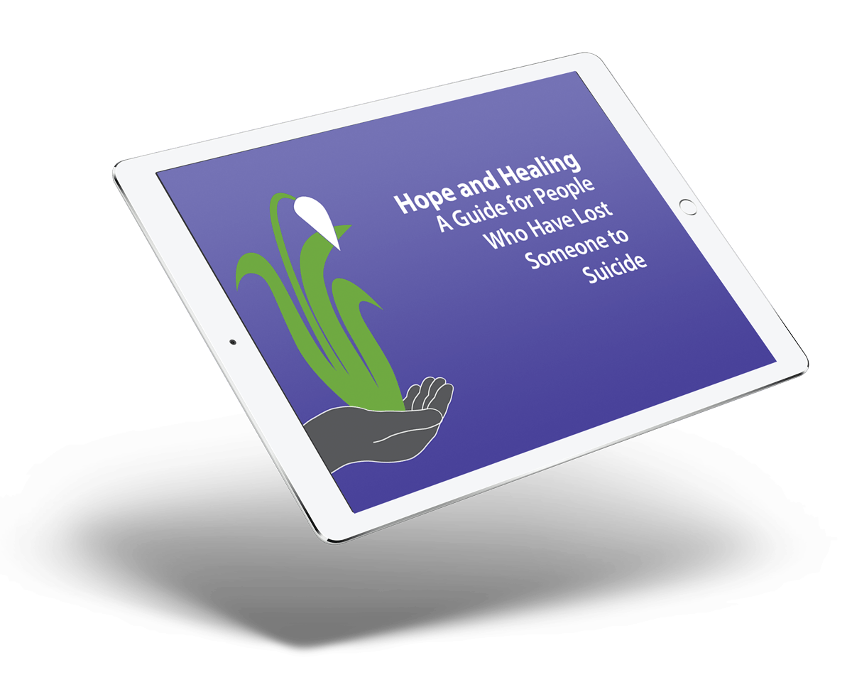 A tablet with a purple screen and a hand holding a plant on it.