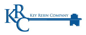 A blue key with the words key resin company on it