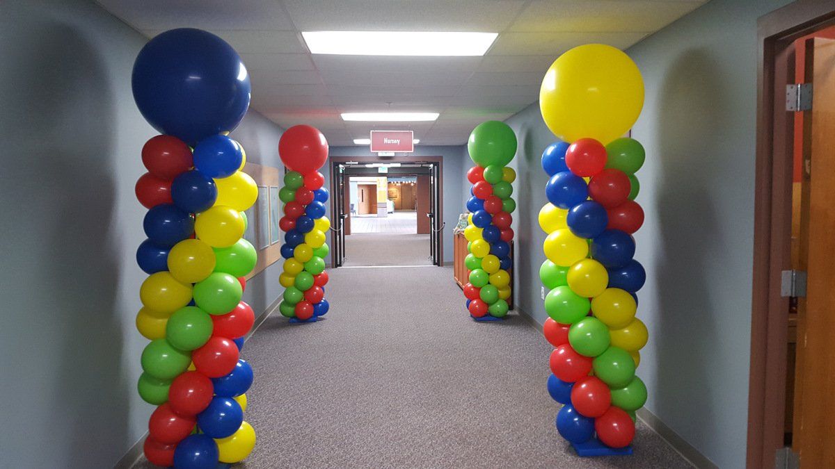 Spiral Balloon Columns creating a Tunnel Effect