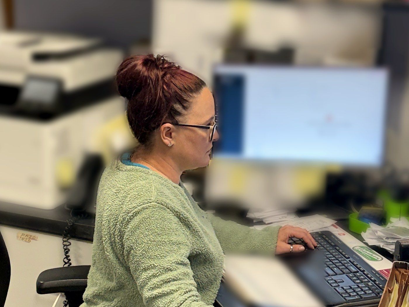 Sarah at the Lakeview Mechanical front desk in Warren, MI, scheduling service calls