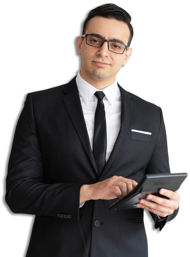 A man in a suit and tie is holding a tablet