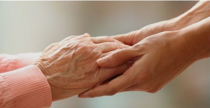 Elderly hands in good care