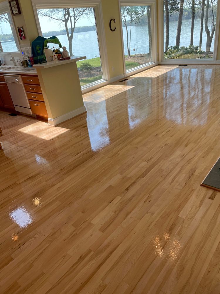 parquet floor - store salesman with flooring samples in hands.