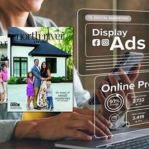 Marketing dashboard beside a house flyer on a laptop, showing display ads and online performance metrics