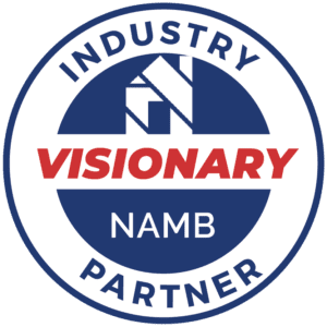 Circular NAMB Industry Visionary Partner logo in blue and white with red “VISIONARY” text