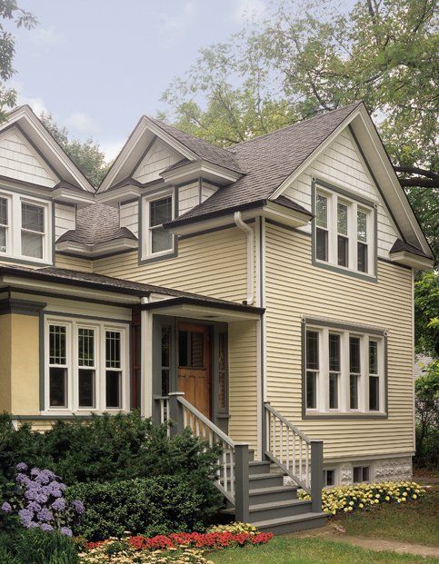 A house with a lot of windows and stairs