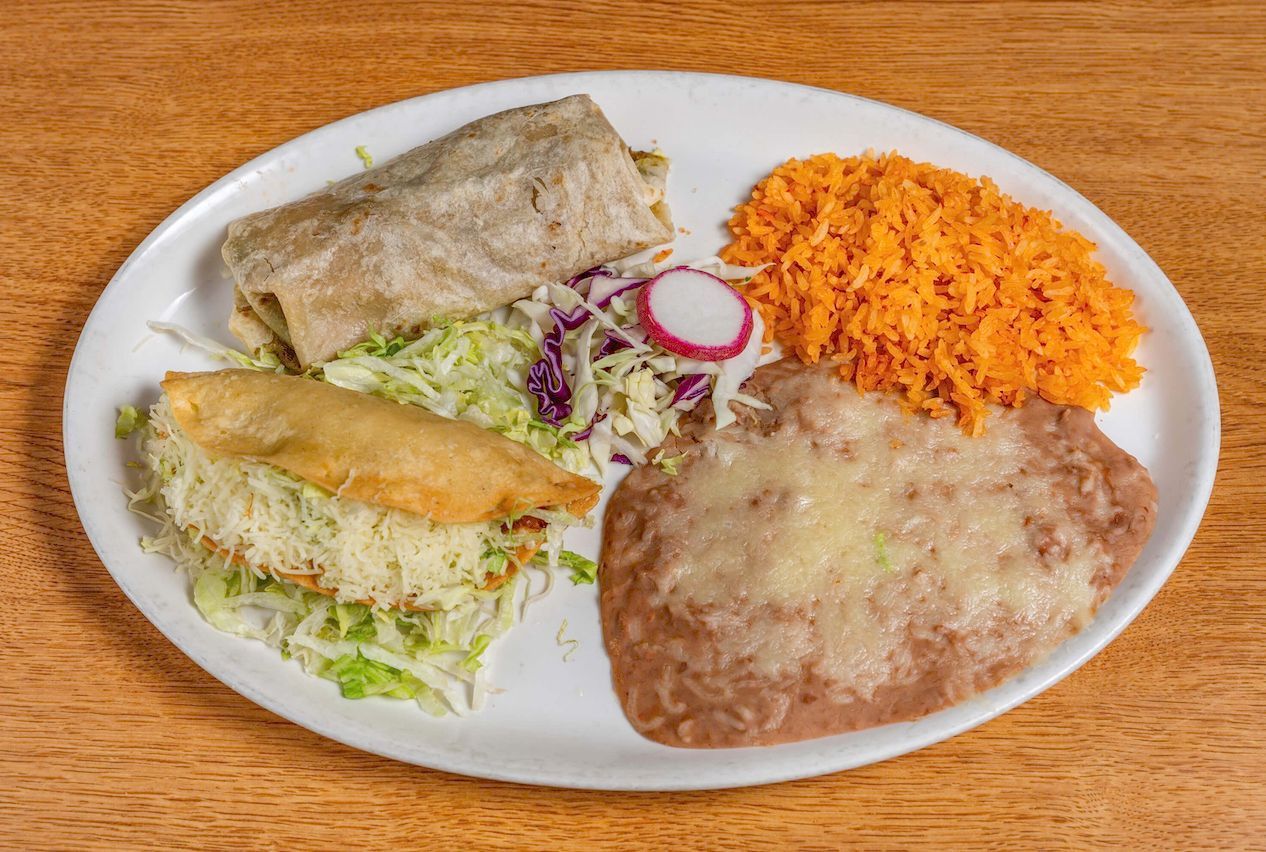 Delicious 2 Item Combination Plate with soft Spanish rice and flavorful refried beans.