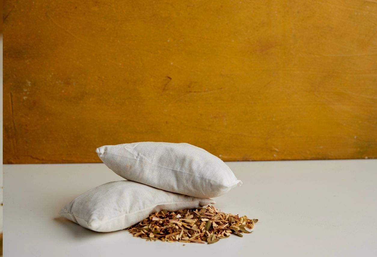 A burlap pouch labeled