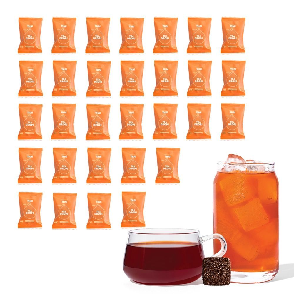A Thai Tea Drops square positioned above its corresponding orange, branded single-serve wrapper.