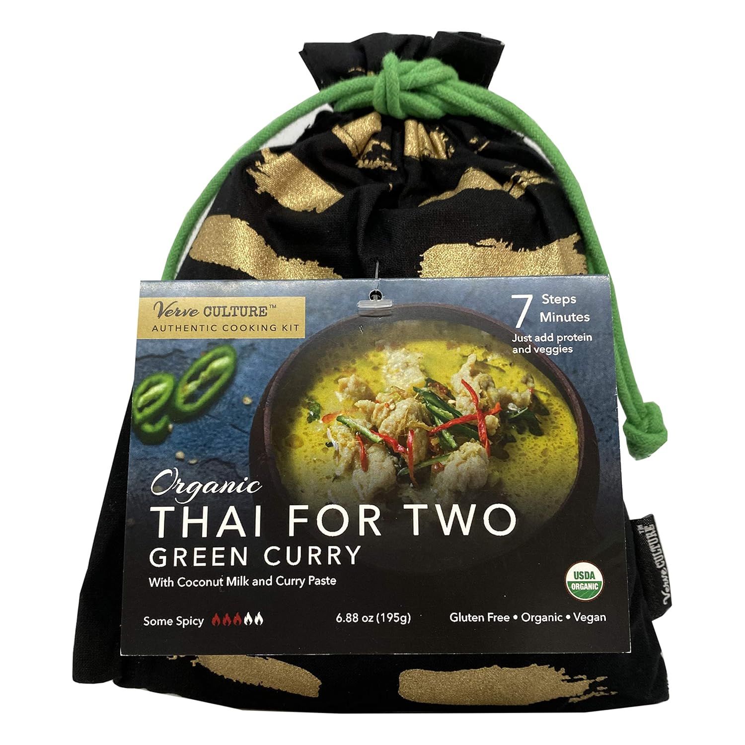 A package of Thai For Two organic green curry kit, presented in a black fabric drawstring bag with gold brushstrokes.