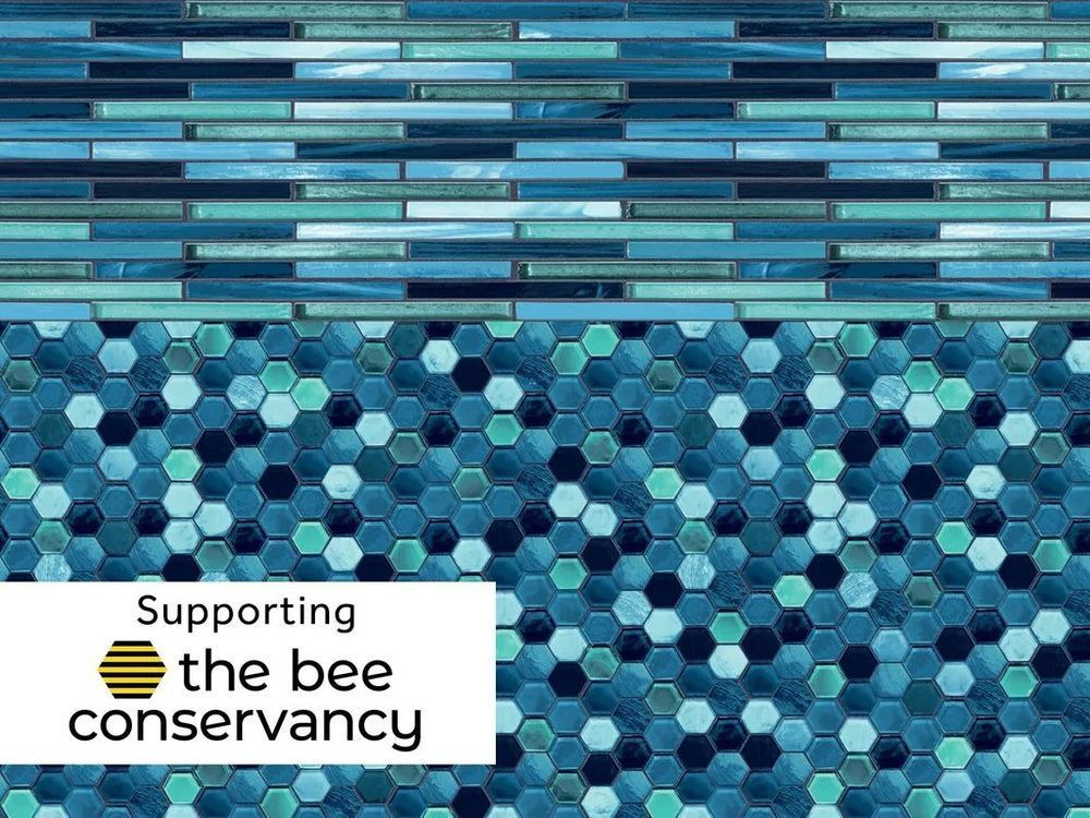 A blue tile wall with a logo for the bee conservancy.