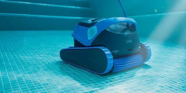 A robotic vacuum cleaner is cleaning a swimming pool.