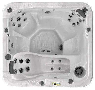 A white hot tub with a lot of jets is sitting on top of a white surface.