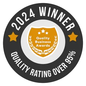 2024 Winner Quality Business Awards badge, black and gold. Features shield, stars, and