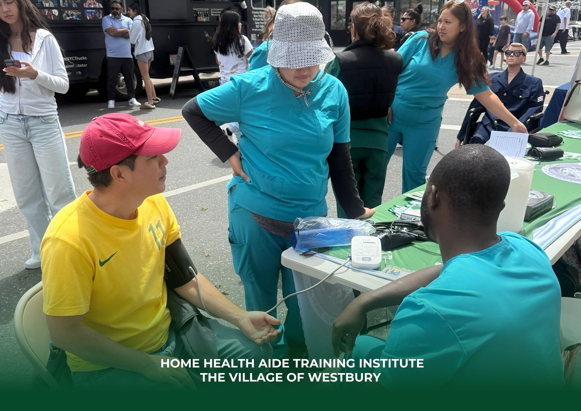 Health care students in scrubs practice taking blood pressure on a person at a Home Health Aide Training Institute event.