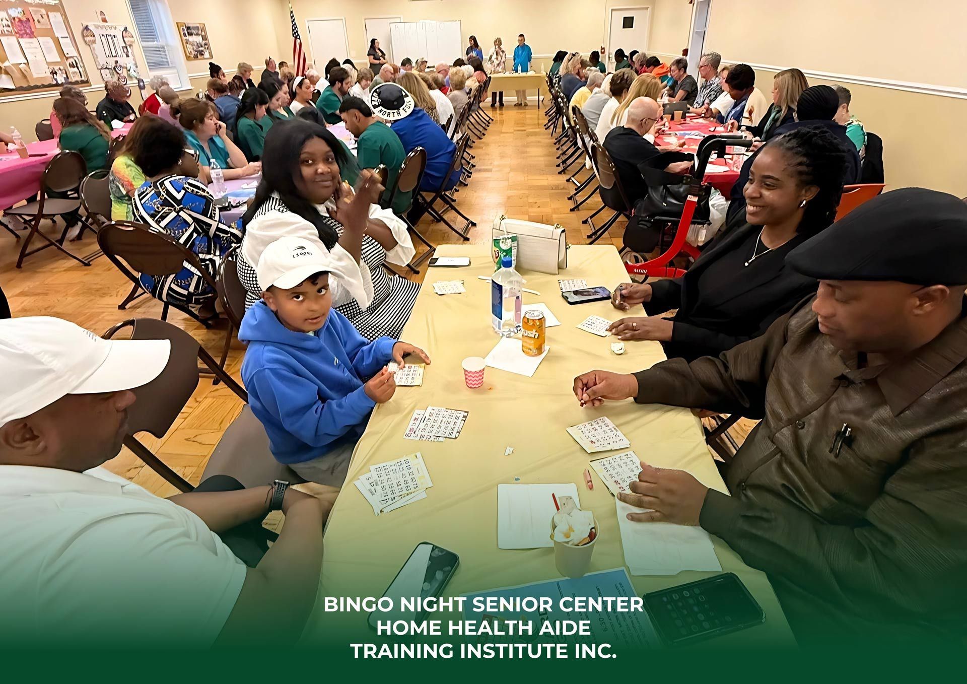 People play bingo at tables in a community center during an event hosted by the Home Health Aide Training Institute.