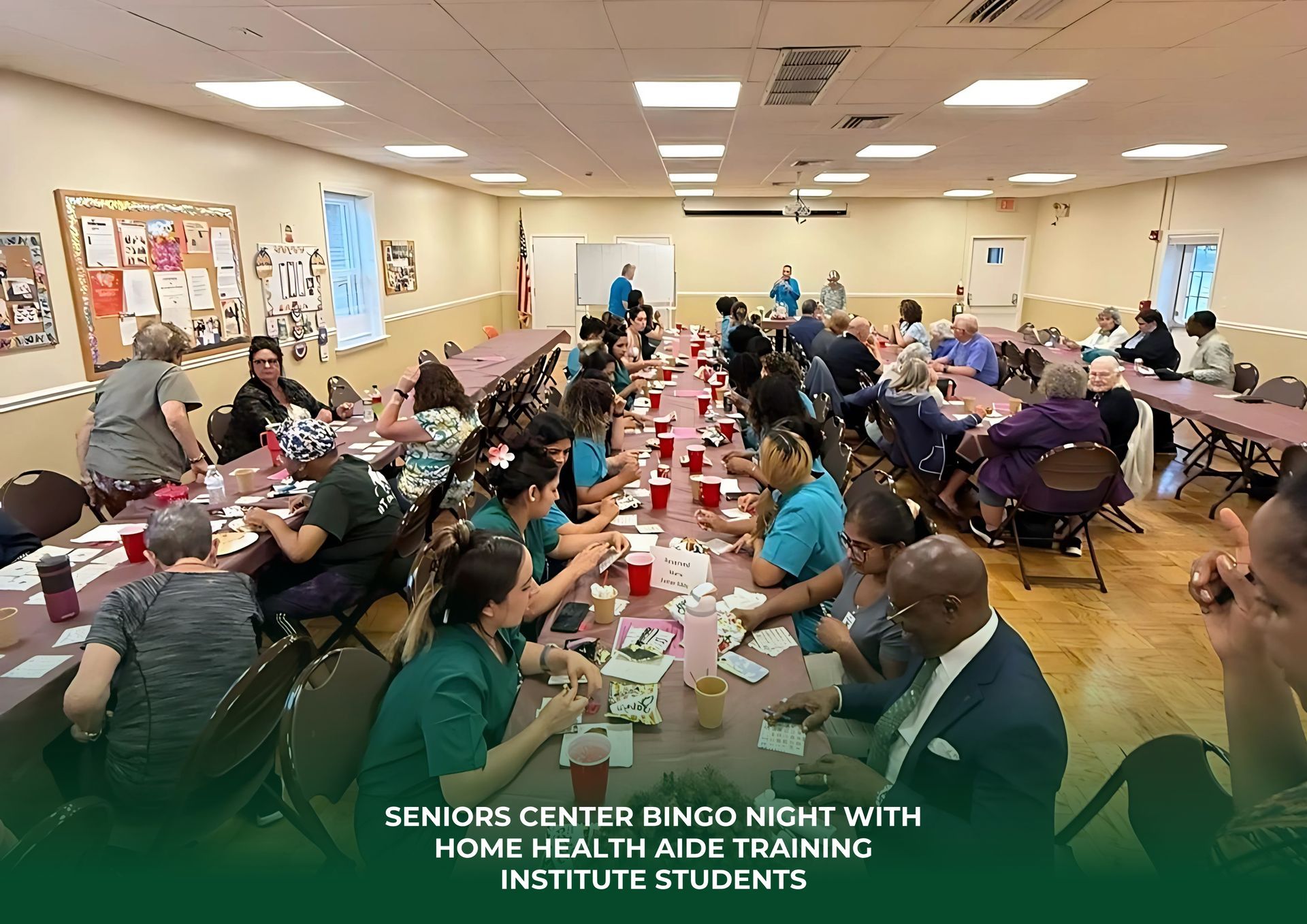 People at tables in a community center during a bingo night with Home Health Aide Training Institute students.