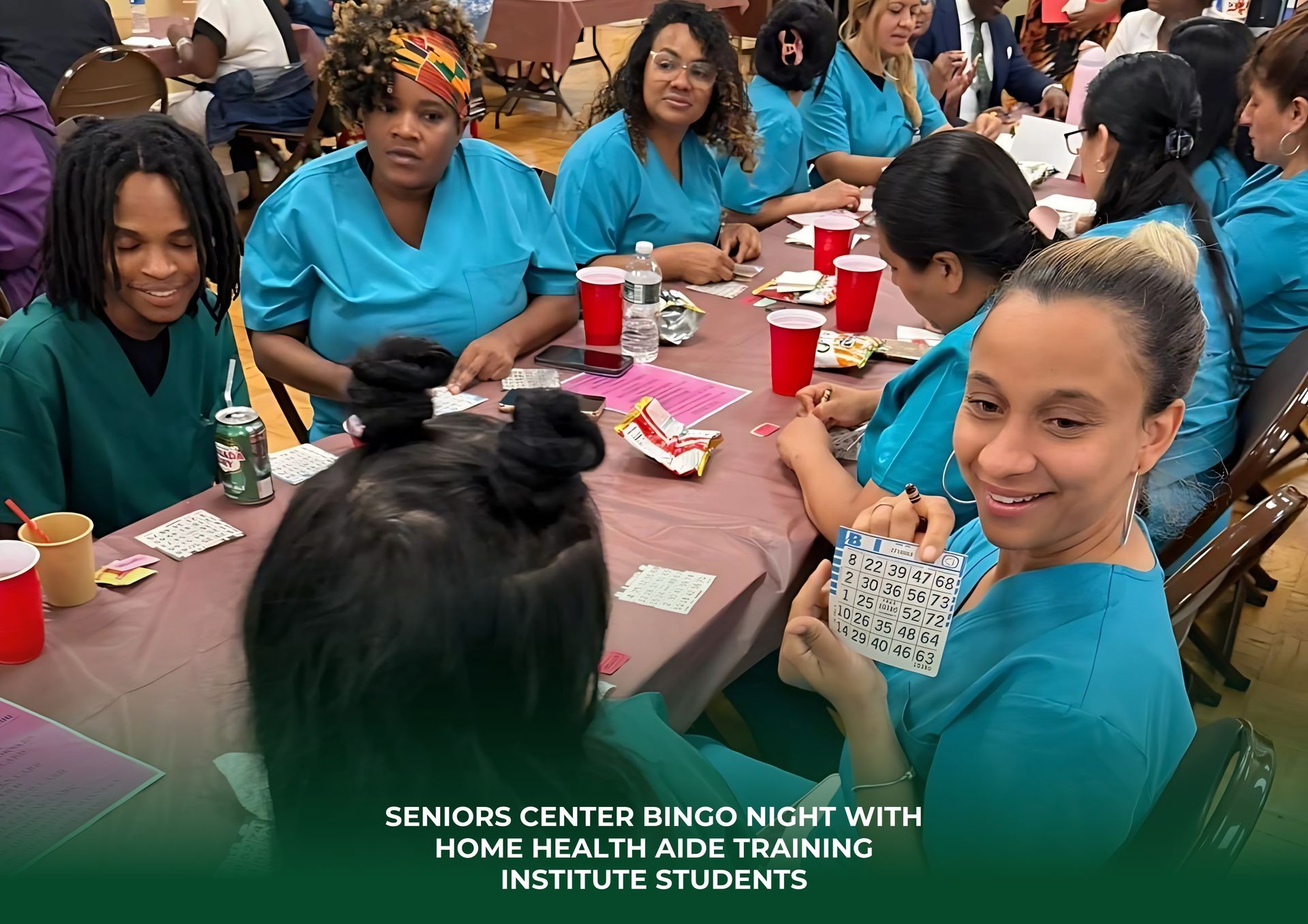 Students in blue scrubs play bingo at tables during a Seniors Center event.