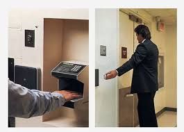 Elevator call button and accessible mounted controls for a wheelchair user at the entrance.