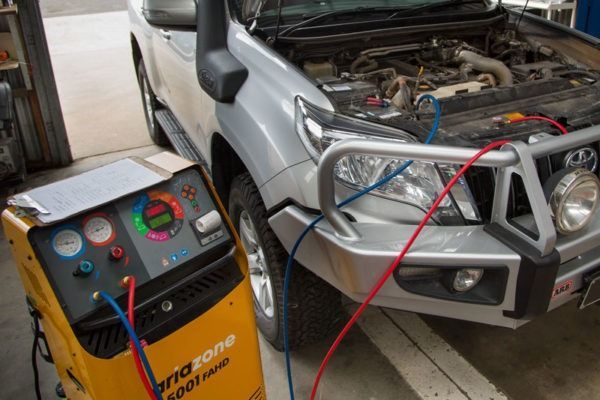 A Car Is Being Checked By A Machine In A Garage — CS Mechanical Repairs & Services In Wauchope, NSW