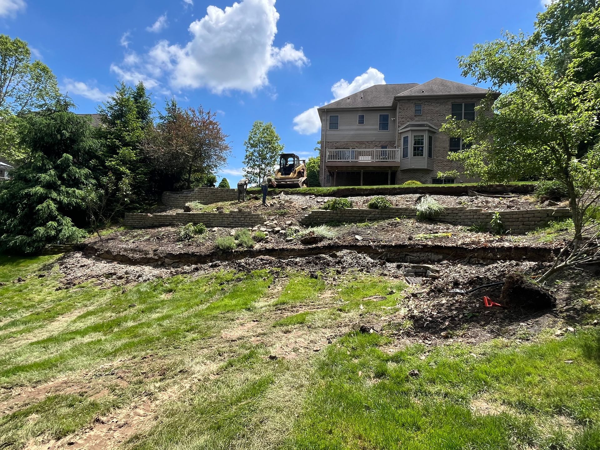 Before retaining wall installation South Hills