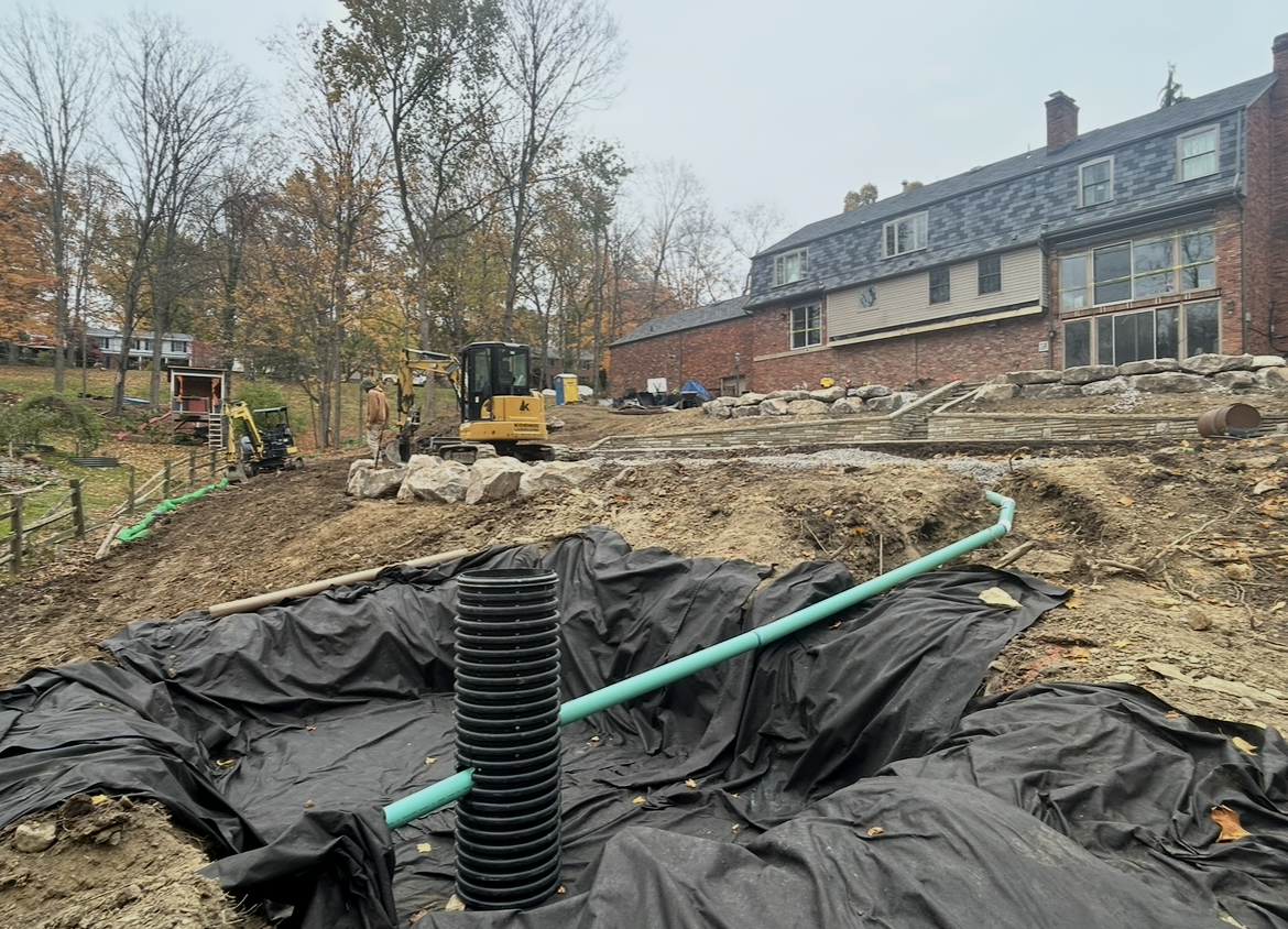 Before retaining wall installation South Hills