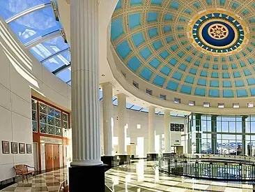 A large building with a dome ceiling and columns