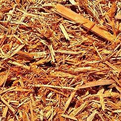 A Pile Of Wood Chips Is Sitting On The Ground — Serious About Landscape Supplies In Terrigal, NSW