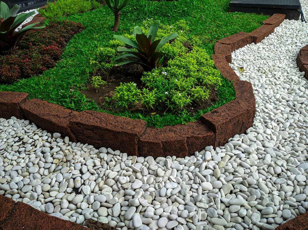 A Garden With Rocks And Plants In It — Serious About Landscape Supplies In West Gosford, NSW