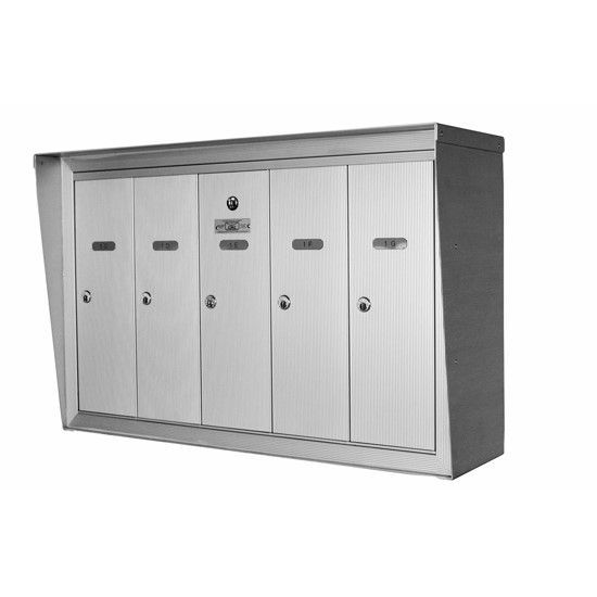 Silver multi-unit mailbox with five compartments and locks.