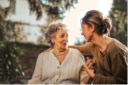 Elderly mother and adult daughter