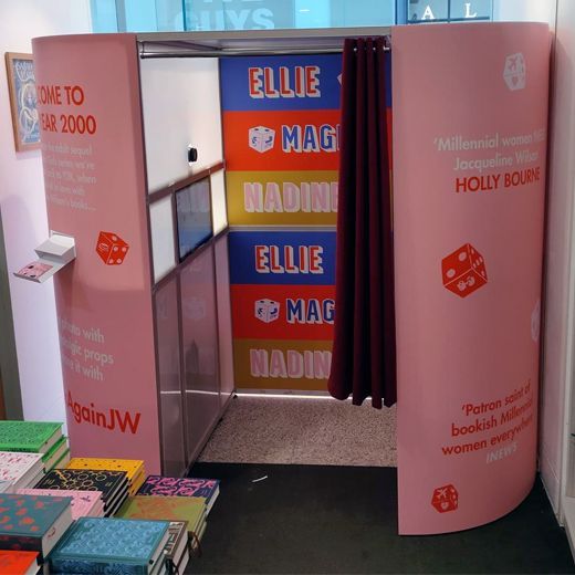 A pink photo booth titled
