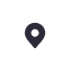 A dark gray map pin icon.