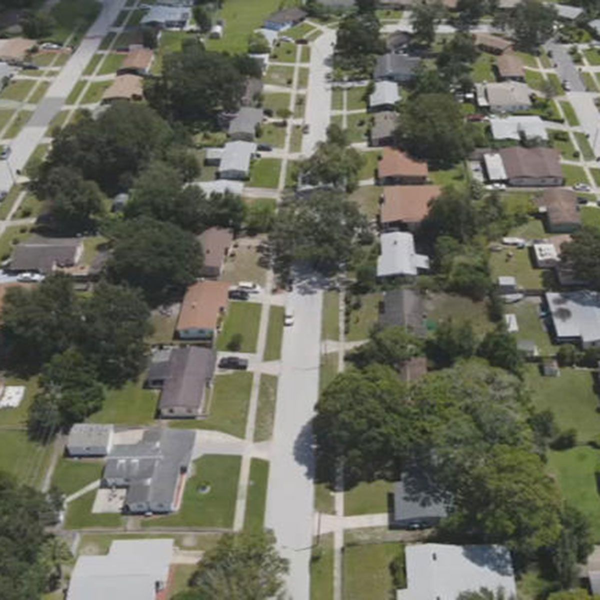 BCU1 An aerial view of a residential area with lots of houses and trees