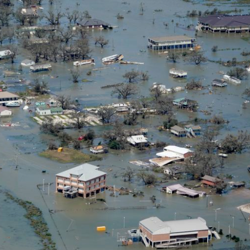 Screen Shot 2023-09-26 at 8.32.13 AM an aerial view of a flooded area with houses and trees