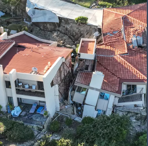 Screen Shot 2023-09-26 at 8.32.21 AM an aerial view of a house that has fallen into the ground
