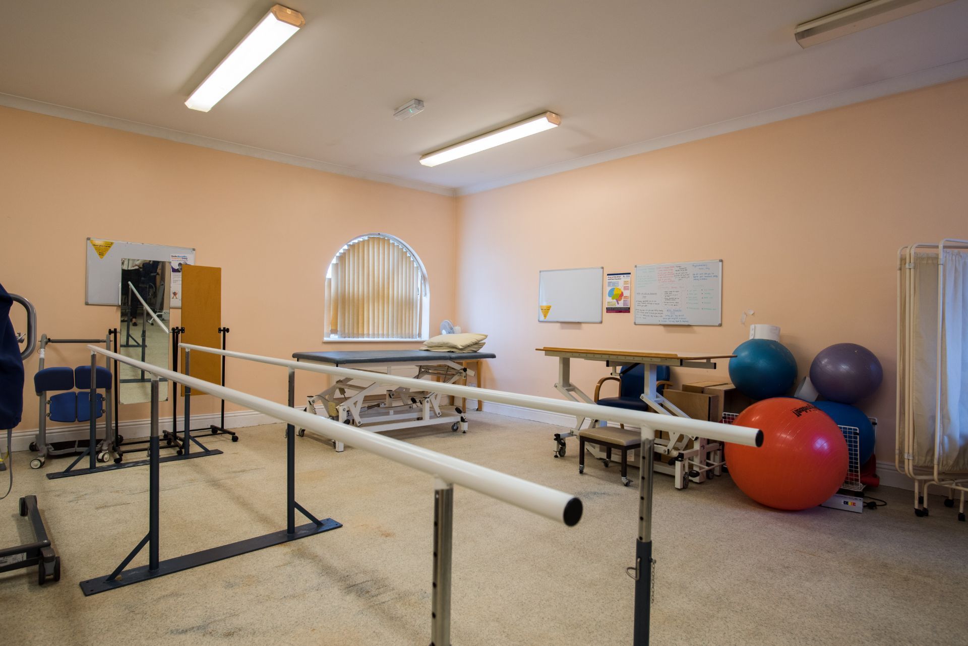 a large open room with a lot of windows and chairs