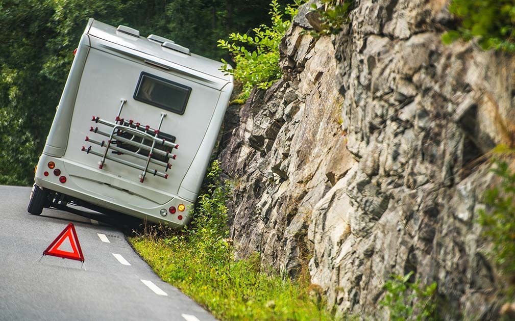 a camper is stuck on the side of the road