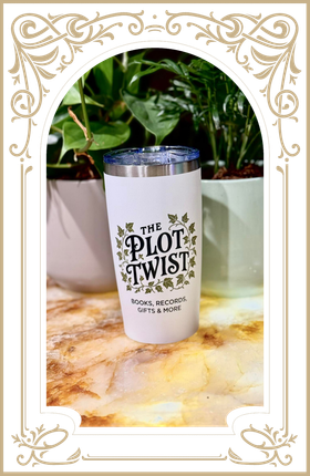 White can labeled “MOON TWIST” with Korean text, standing on a marble surface beside a leafy plant.