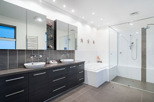 A Bathroom With Two Sink, a Bathtub, and a Walk in Shower — Precision Shower Screens & Wardrobes In Yarrawonga, NT
