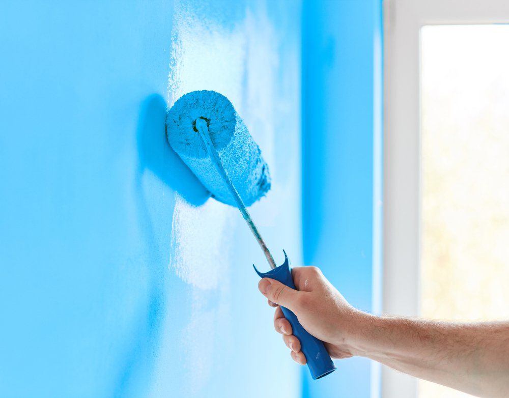Painting Wall with Color Blue — Ingram, TX — Dean's Painting Tony Painting Wall with Color Blue — Ingram, TX — Dean's Painting Tony