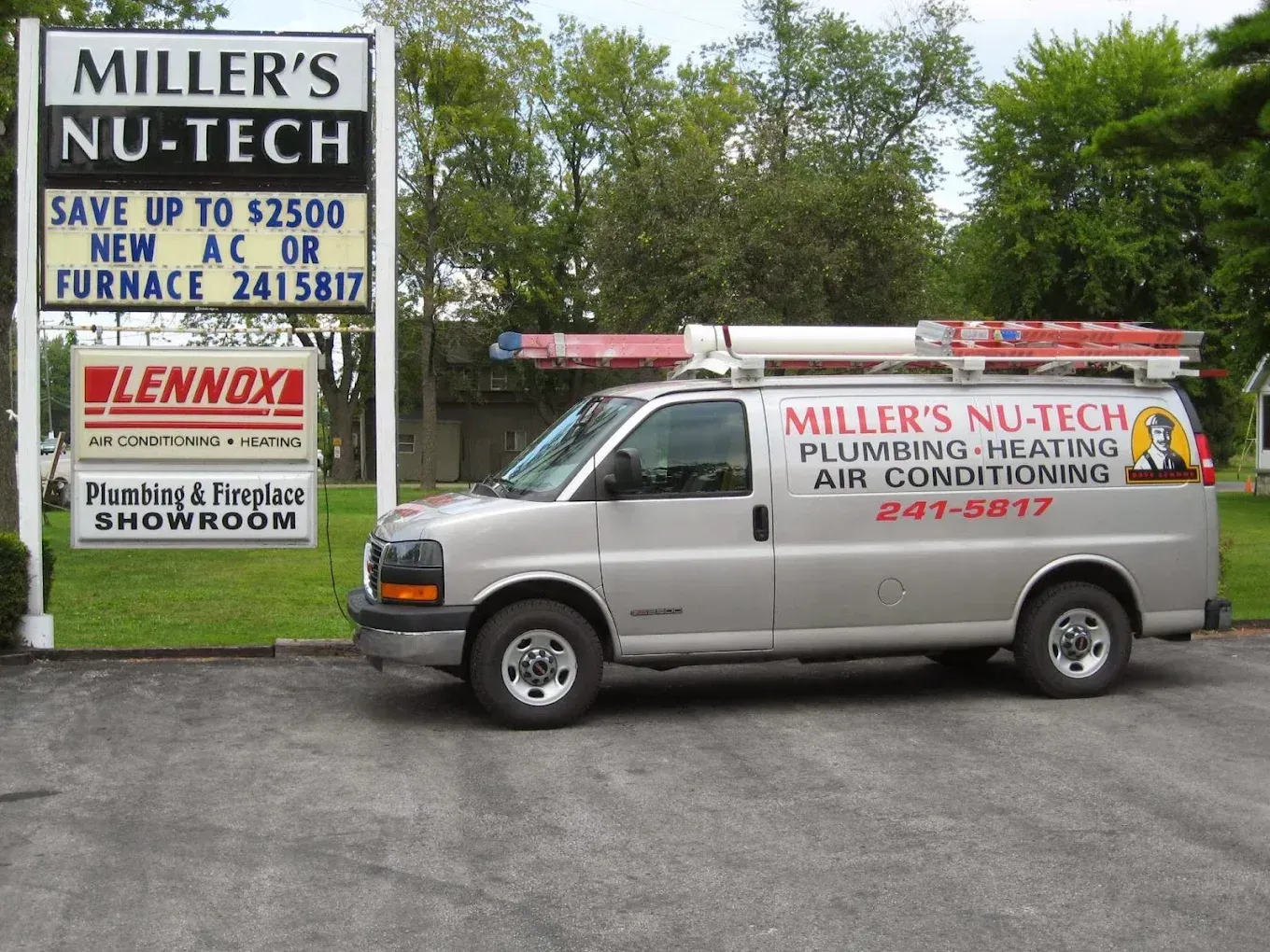 A silver service van parked in front of a Miller’s Nu-Tech sign advertising plumbing, heating, and air conditioning.