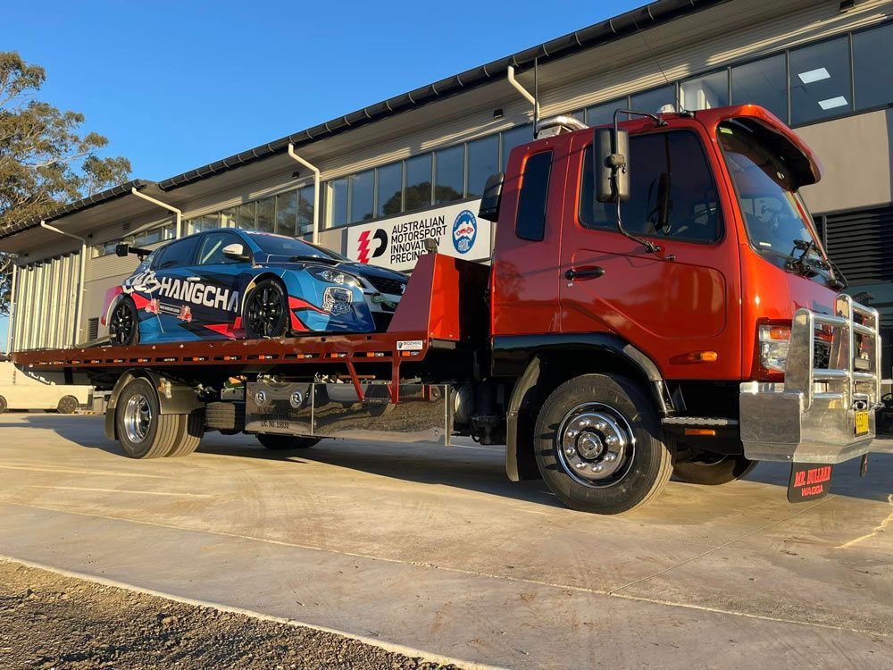 Astra TCR On The Red Towing Truck — Trade & General Towing in Lambton, NSW