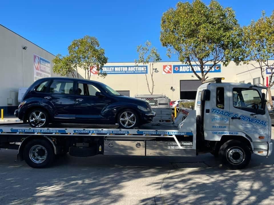 Blue Chrysler Pt Cruiser Towed — Trade & General Towing in Beresfield, NSW