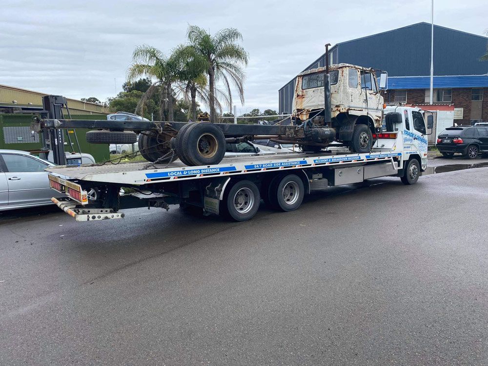 Broken Mitsubishi Fuso Truck Towed — Trade & General Towing in Charlestown, NSW