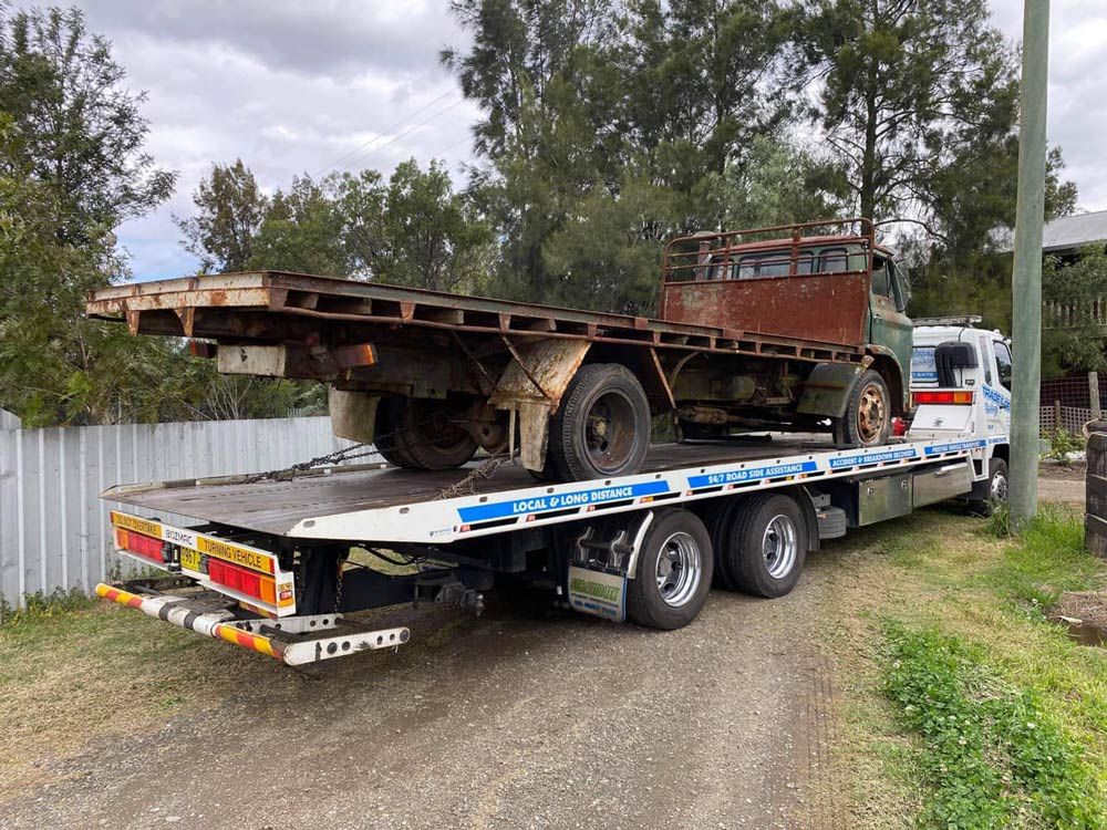 Flatbed Salvage Truck — Trade & General Towing in Sandgate, NSW