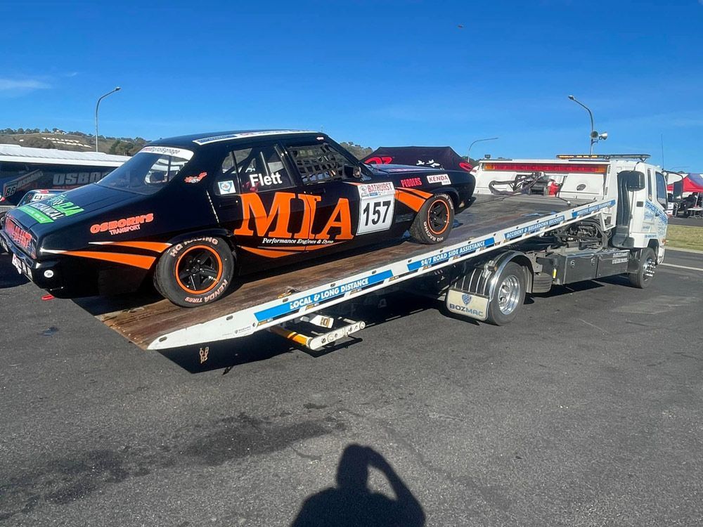 MIA Racing Car — Trade & General Towing in Sandgate, NSW
