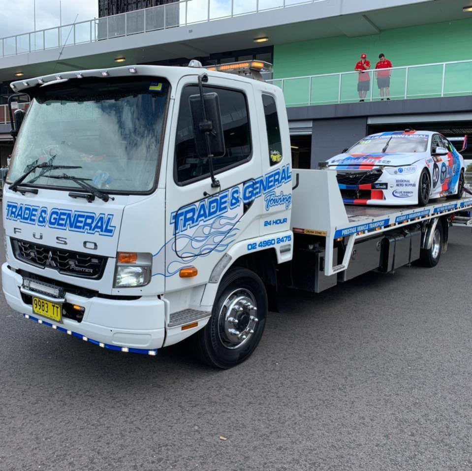 Supercar Racing Loading on the Towing Truck — Trade & General Towing in Hexham, NSW